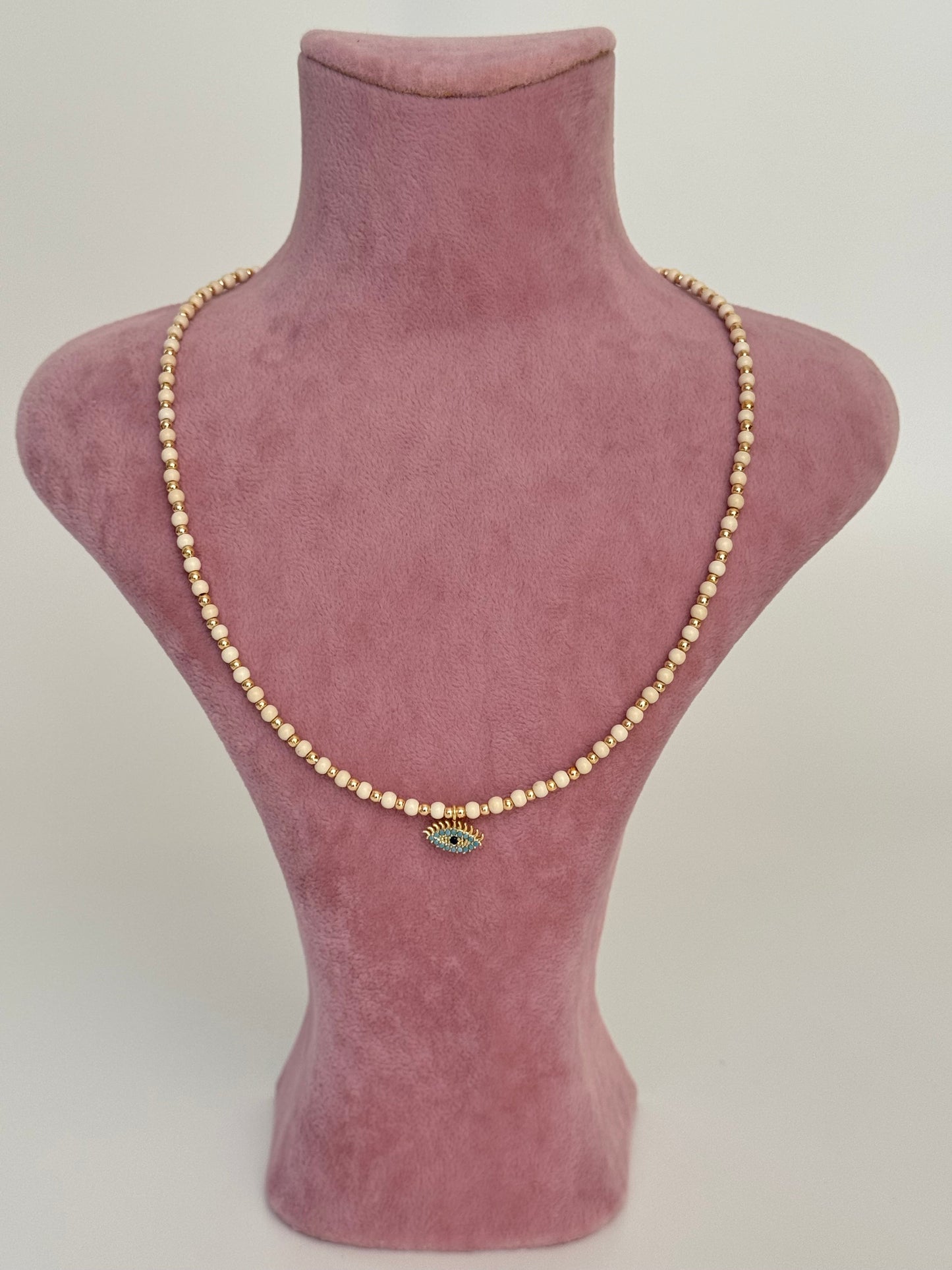 Eye-Catching Gold-Plated Necklace with Beaded Charm Detail