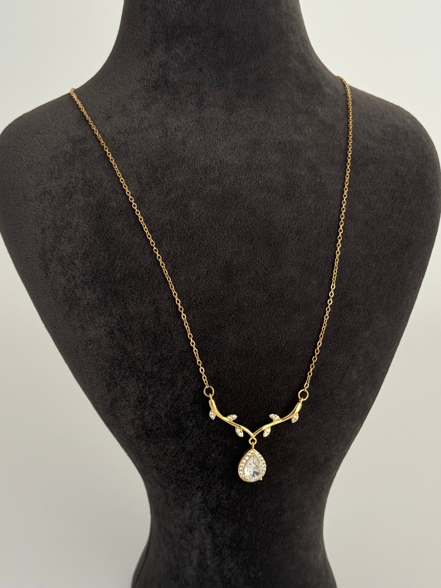 Stunning Gold Steel Necklace with Baget Stone Accents