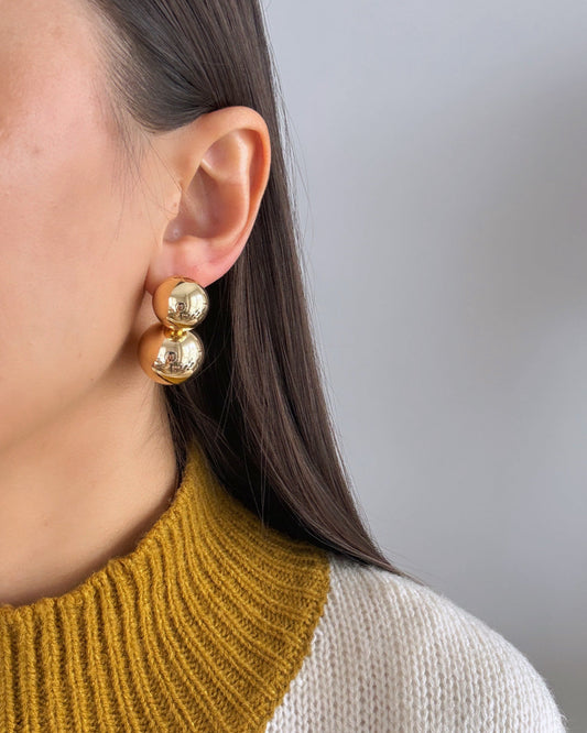 Earlene Imported Gold Earrings with Stylish Top Detail