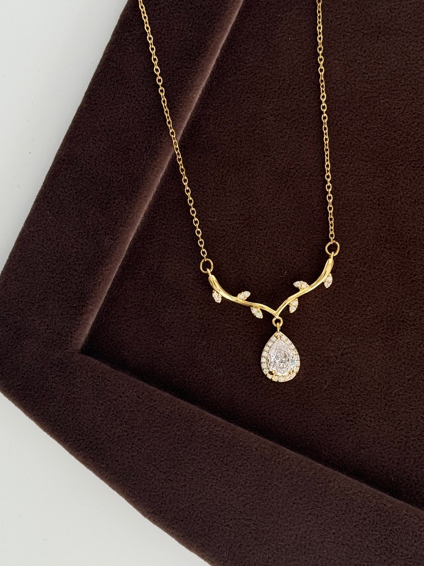 Stunning Gold Steel Necklace with Baget Stone Accents