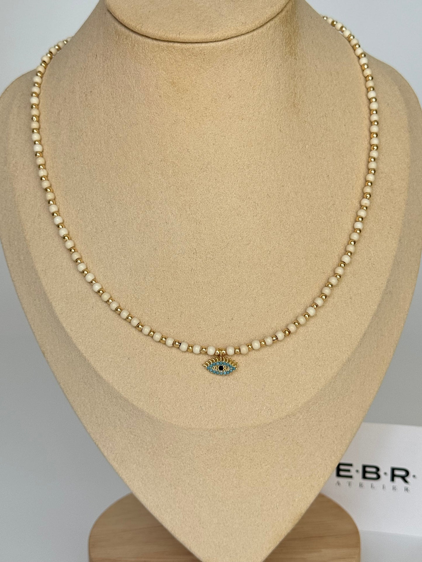 Eye-Catching Gold-Plated Necklace with Beaded Charm Detail