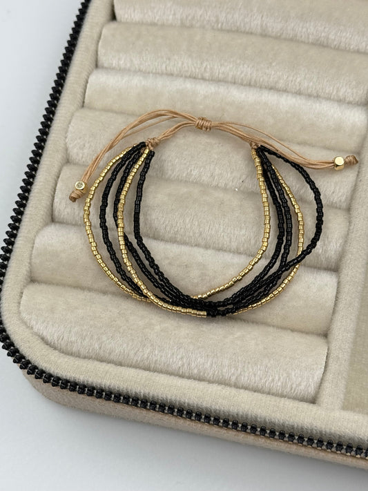 Adjustable Black Gold Glass Bead Bracelet - Elegant and Stylish Accessory