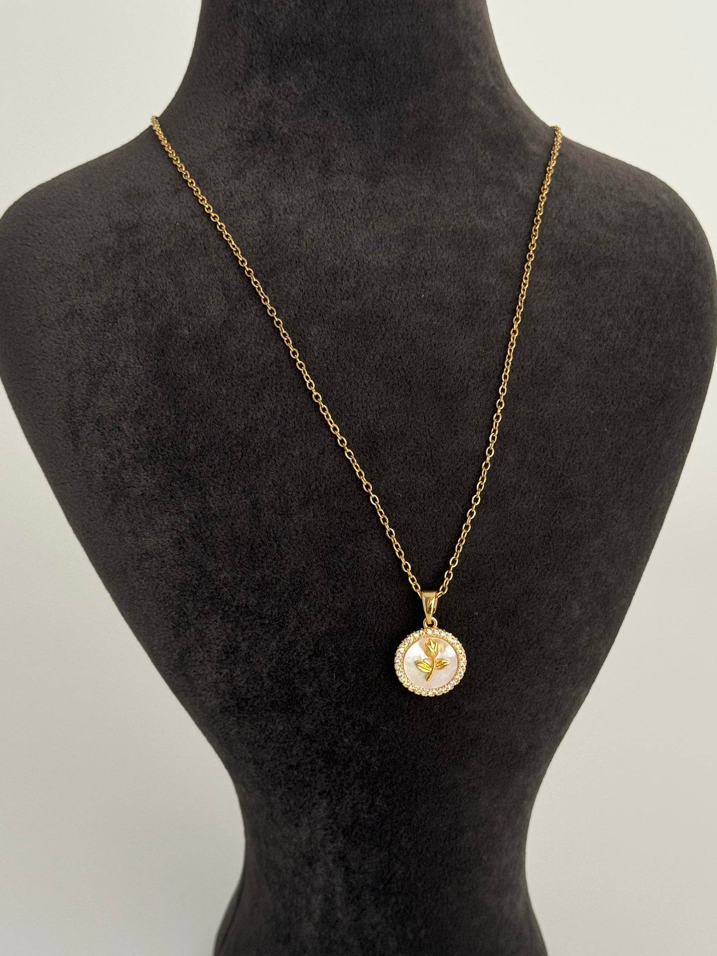 Elegant Gold Steel Necklace with Rose Detail